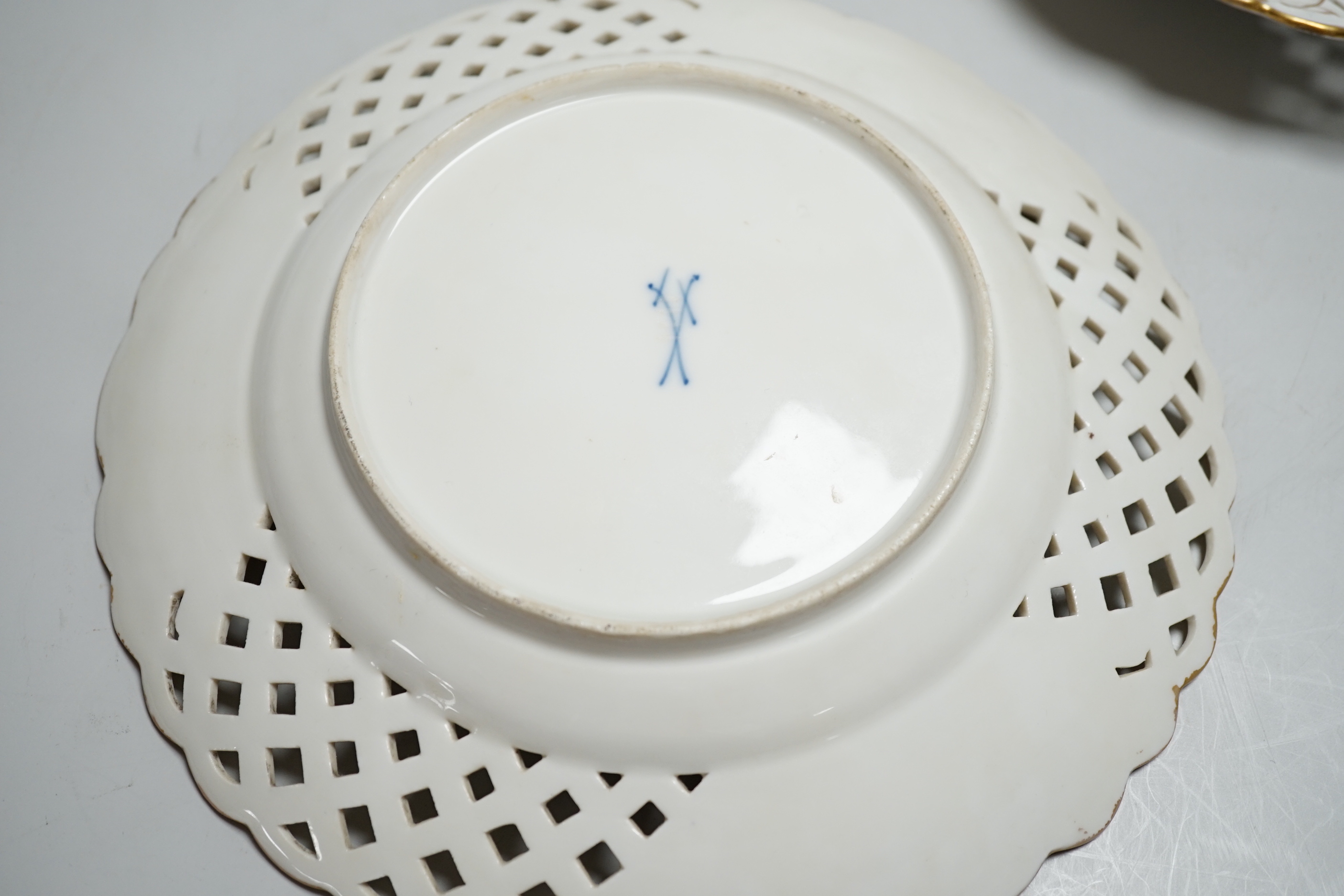 A pair of Meissen outside-decorated bird and flower dishes, 23cm diameter